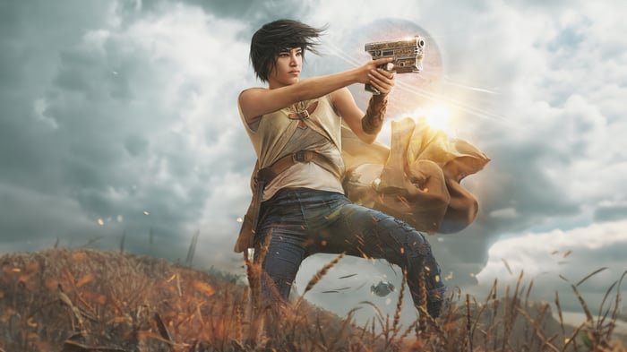 Kora from Rebel Moon firing a futuristic gun