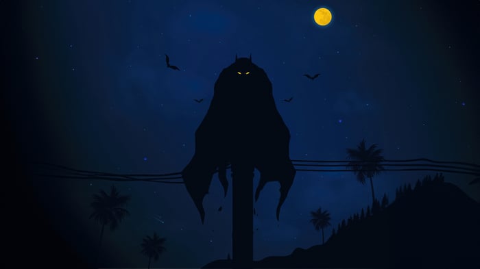 Batman silhouette against a starry night sky