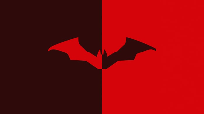 The Batman Logo Split Between Red and Dark Red