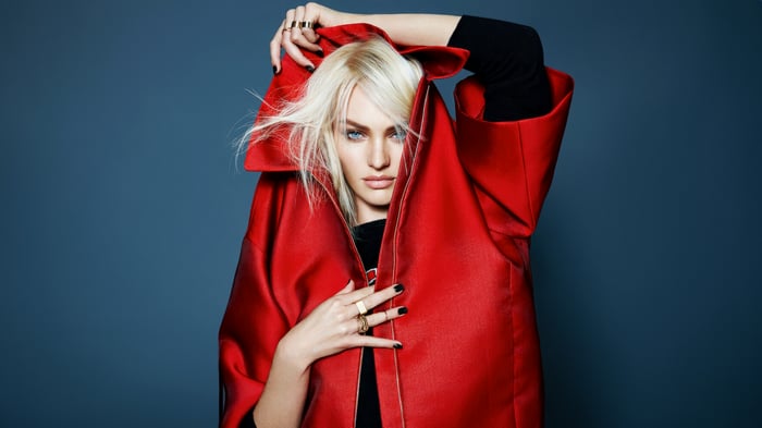 Candice Swanepoel in a red coat