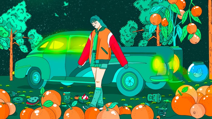Girl and car at an after party with oranges