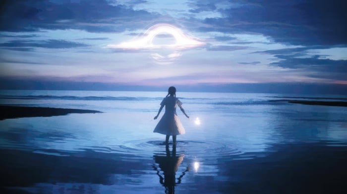 Girl standing in water with a black hole in the sky