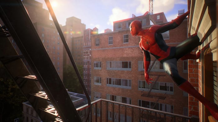 Spider-Man climbing a building