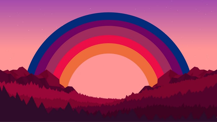 Rainbow over a stylized mountain landscape