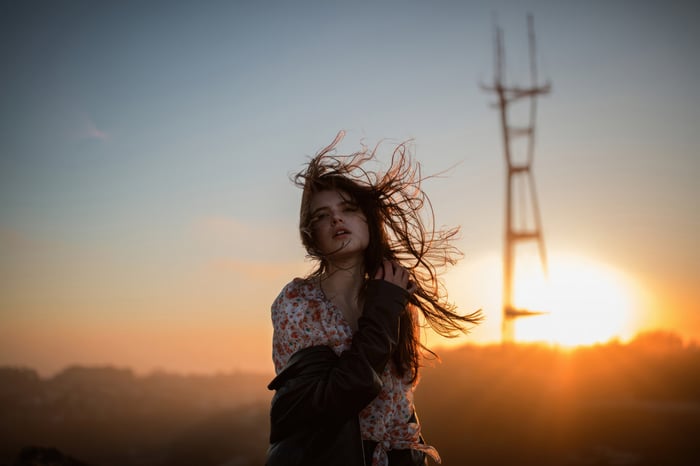 Girl in Golden Hour with Windblown Hair