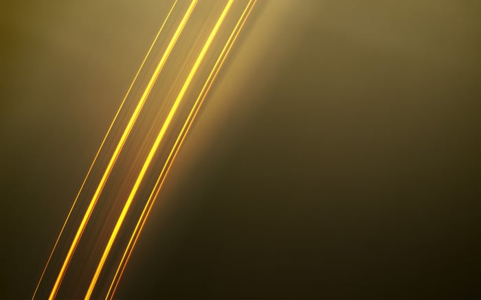 Abstract gold lines on a dark background