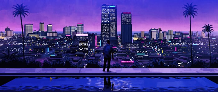 Man overlooking a neon city skyline at night