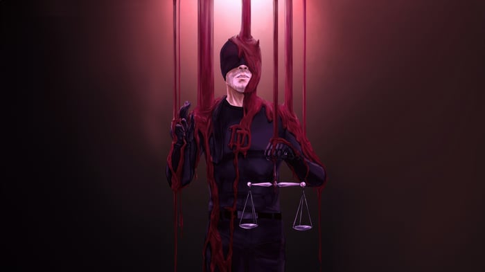 Daredevil Covered in Red Substance Holding Scales
