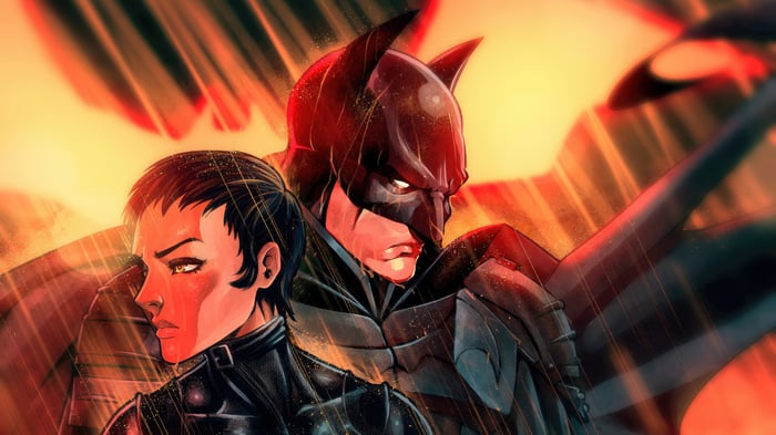 Batman and Catwoman in a dramatic scene