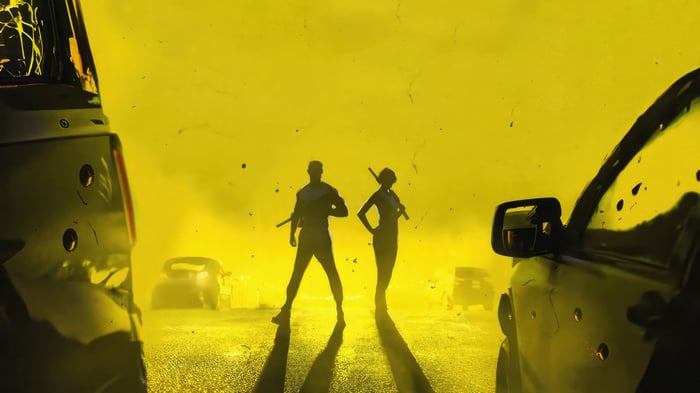 Two figures with weapons stand between cars in a yellow haze