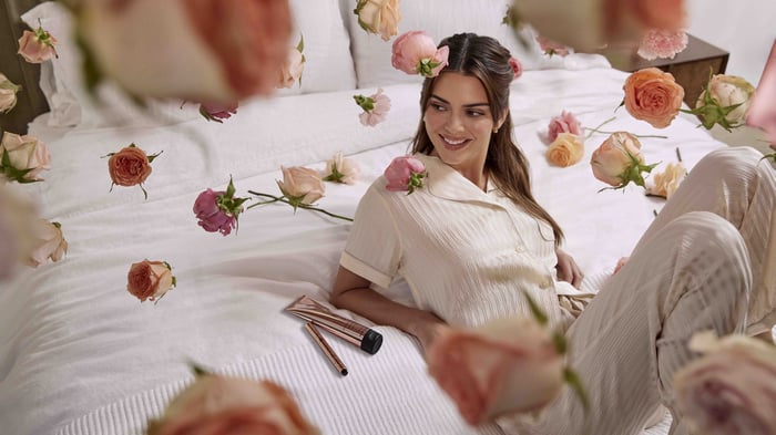 Kendall Jenner in pajamas surrounded by roses