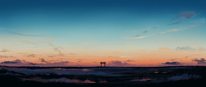 Torii gate at sunset over a marsh