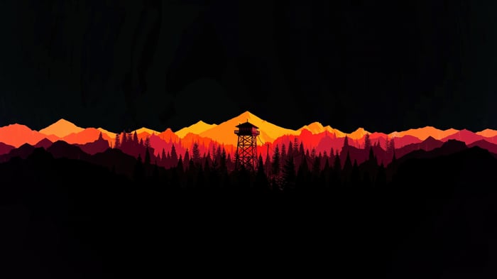 Firewatch tower silhouette against fiery mountain sunset