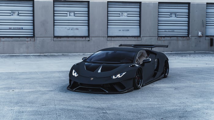 Black Lamborghini Huracan Evo with a large rear wing