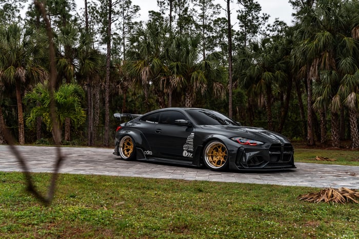 Widebody BMW M4 Coupe with Gold Wheels