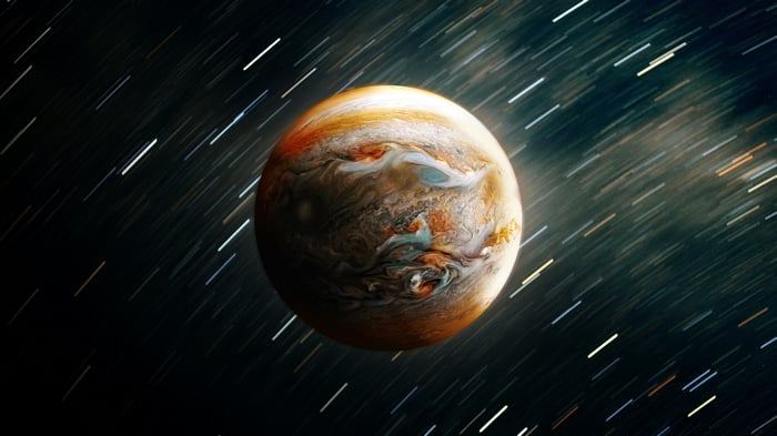 Jupiter with star trails in space