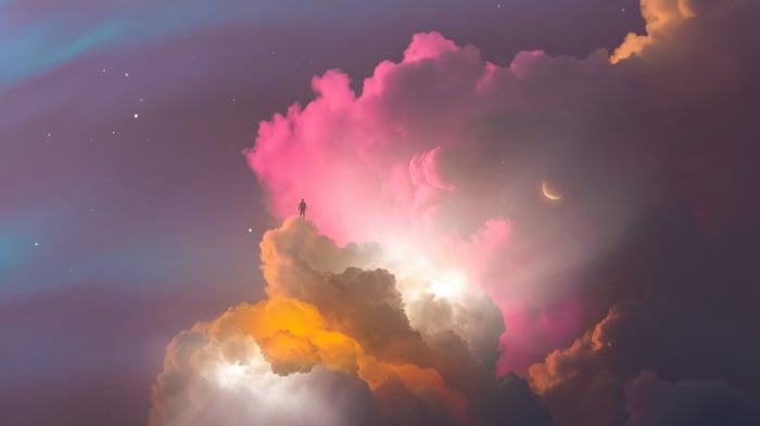 Man Standing on Clouds with Moon and Stars