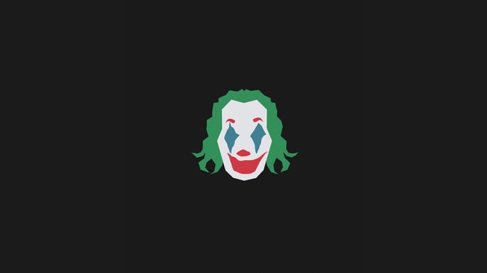 Minimalist Joker face on dark background