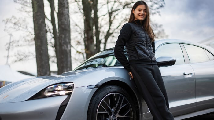 Emma Raducanu Poses with a Porsche
