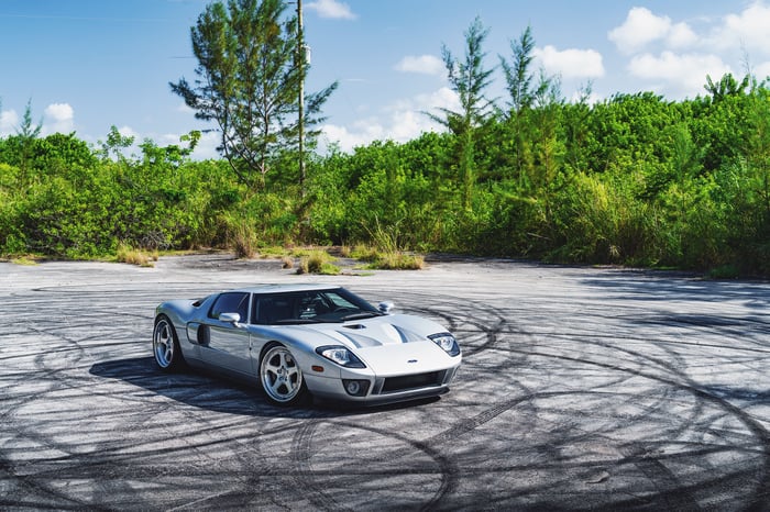 Silver Ford GT Gen 1 on asphalt with tire marks