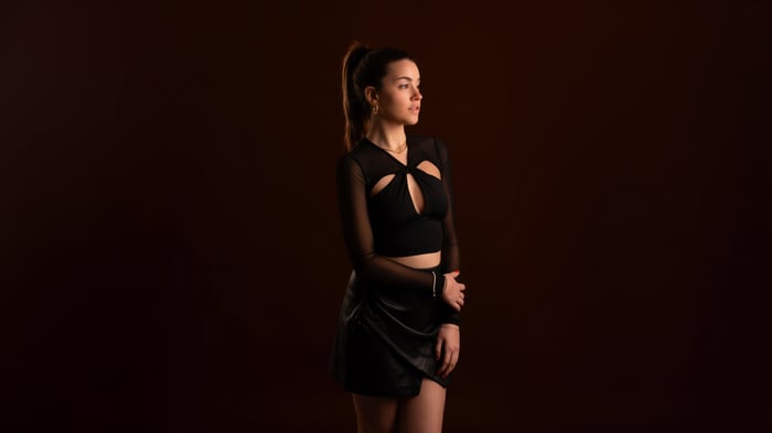 Girl in black outfit with cutout top