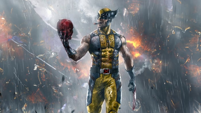 Wolverine Holding Red Mask in a War Zone