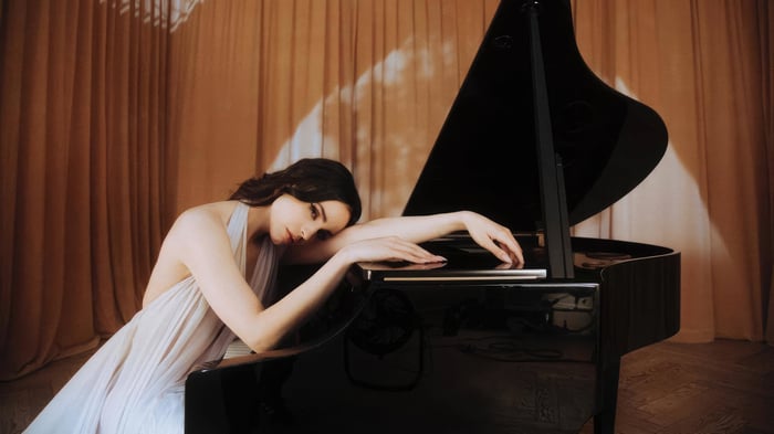 Sofia Carson by a Grand Piano