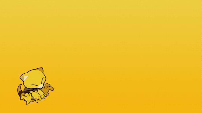 Abra Pokemon sitting on yellow background