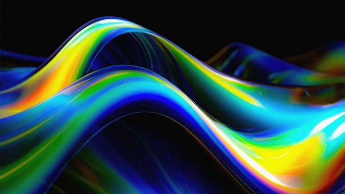 Abstract waves of iridescent colors on a black background