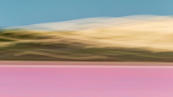 Abstract landscape with pink and blue hues