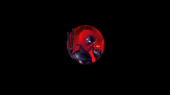 Deadpool with a finger to his lips