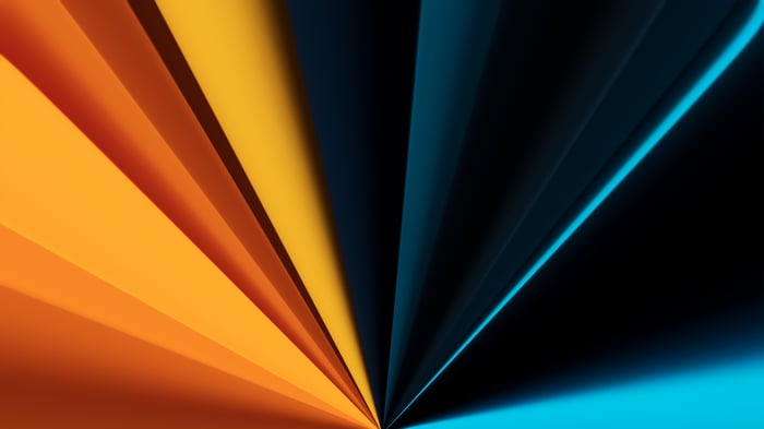 Abstract beams of orange and blue light