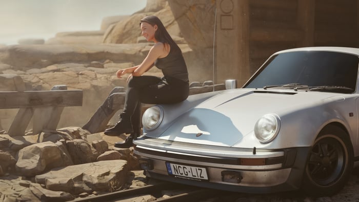 Woman sitting on a Porsche 911