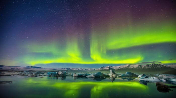 Aurora Borealis over a glacial lagoon