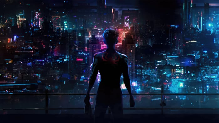Miles Morales overlooking a neon city skyline