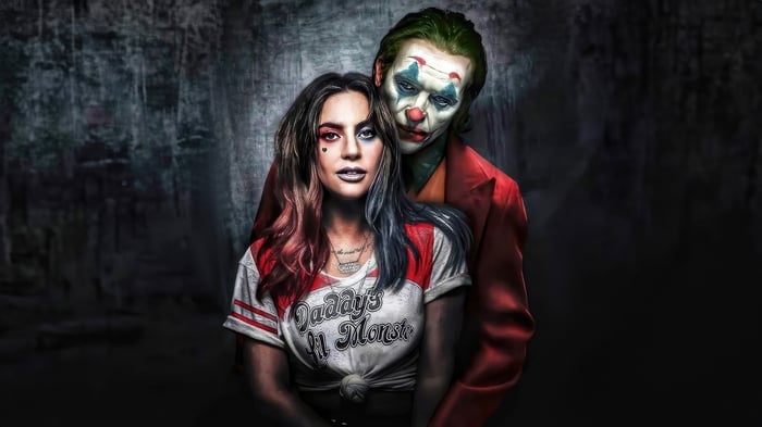 Joker and Harley Quinn embrace