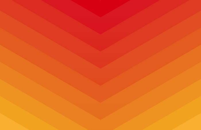 Abstract gradient of red and orange chevron pattern