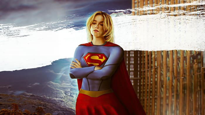 Supergirl in a blue and red costume