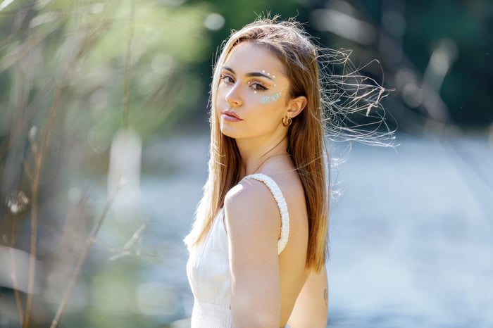 Beautiful Girl With Glitter Eye Makeup Outdoors