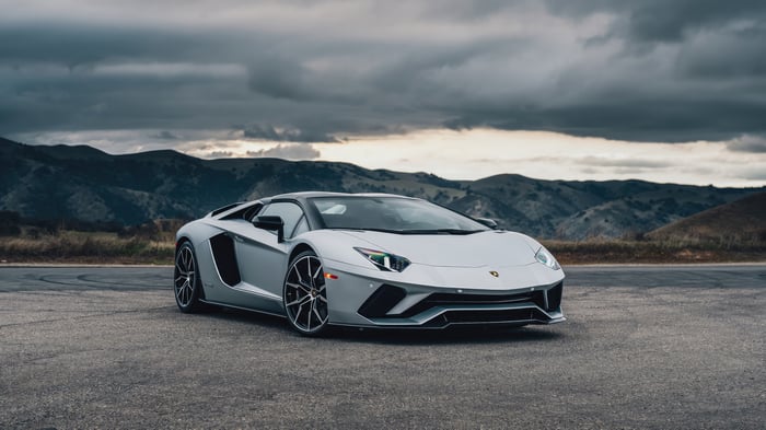 Silver Lamborghini Aventador V12 on a road