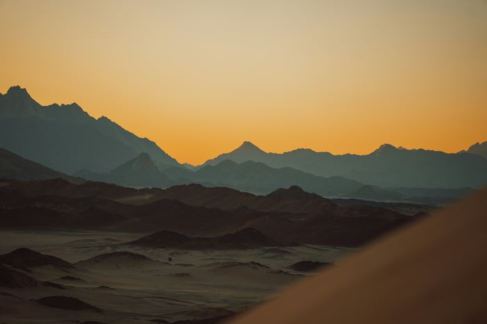 Sunset over desert mountains