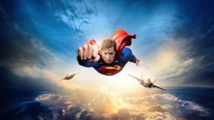 Superman flying with fighter jets