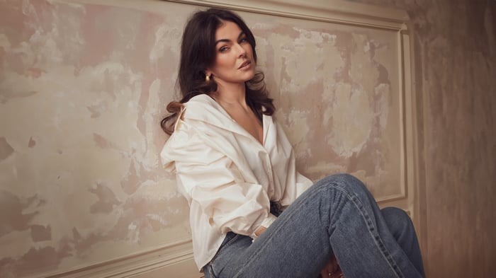 Serinda Swan in white shirt and jeans
