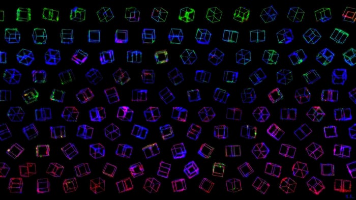 Array of colorful wireframe cubes on black background