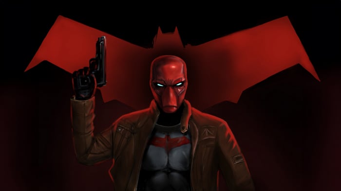 Red Hood Holding a Gun with Batman Symbol