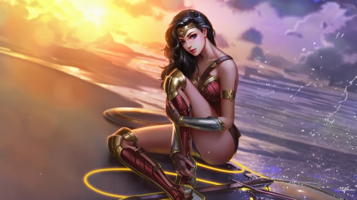 Wonder Woman sitting on a beach at sunset