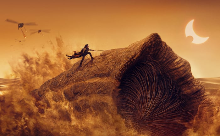Paul Atreides riding a sandworm