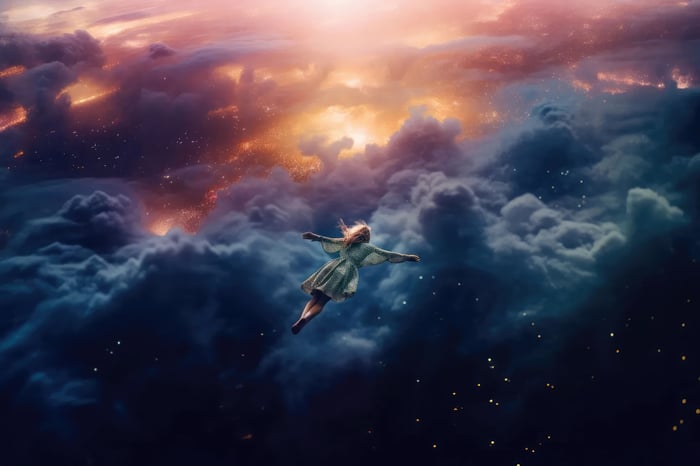 Girl floating in a dreamlike sky with clouds and stars