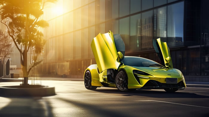 Yellow McLaren Artura with doors open