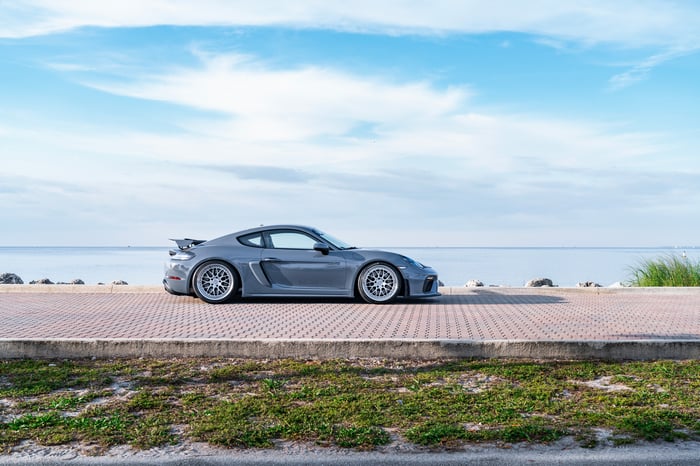 Porsche 718 Cayman GT4 parked by the ocean